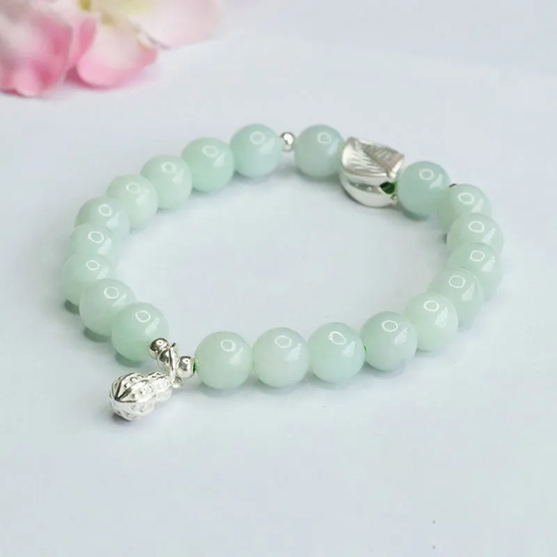 Fortune's Favor Sterling Silver Jade Bracelet with Peanut Leaf Design